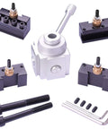 Mini lathe quick-change tool post set with aluminum post and four black tool holders, bolts and hex keys