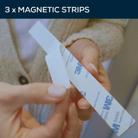 Hands holding magnetic strips for Wireless Motion Sensor Closet Lights 3 Pack 30 LED Cabinet LED Strip Cordless And Rechargeable