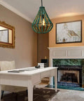 Rustic grey-blue wood beaded chandelier light fixture above home office desk with fireplace, boho farmhouse vibe pendant ceiling lamp.