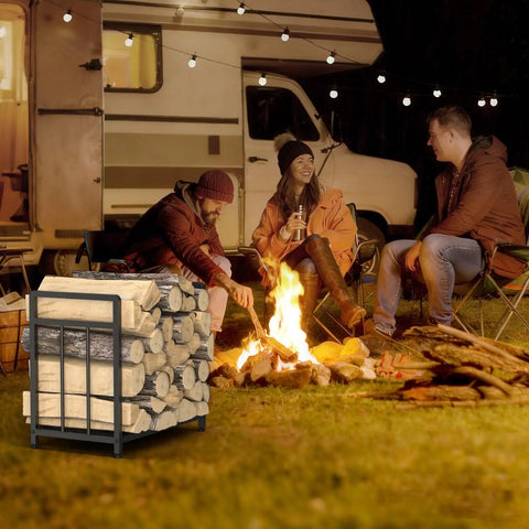 15.5 Inch Compact Metal Firewood Rack with Built-In Fire Blower near campfire and RV, ideal for storing wood outdoors