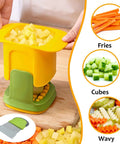 HONSNKS kitchen hand-press cutter with yellow hopper and green base; potato cubes visible in hopper
