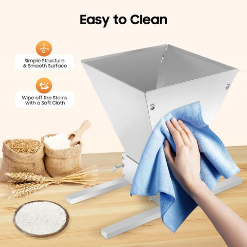 Manual Grain Mill With Adjustable Roller Gap For Wheat Berries, easy to clean stainless steel housing being wiped with cloth