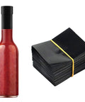 Stack of black shrink bands next to a hot sauce bottle, Shrink Bands 50x60mm Black Pack Of 200 Tamper Evident Seal For Hot Sauce And Other Liquids