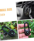 Portable Double Sided Hiking Compass With Carabiner Pocket Sized Mini Outdoor Navigation Tool shown clipped to backpack and held by hand