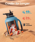 Half Gallon Insulated Water Jug With Comfy Grip Handle Keeps Your Drinks Ice Cold All Day Long No Fuss Carry Design, blue jug with ice and strawberries.