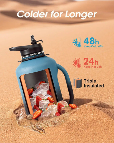 Half Gallon Insulated Water Jug With Comfy Grip Handle Keeps Your Drinks Ice Cold All Day Long No Fuss Carry Design, blue jug with ice and strawberries.