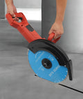 Heavy Duty 14 Inch Circular Concrete Saw With 3000 Watt Electric Motor and Tough As Nails Build for Ripping Through Masonry Machines Featuring Deep Five Point Three One Inch Cutting Depth in use cutting concrete.