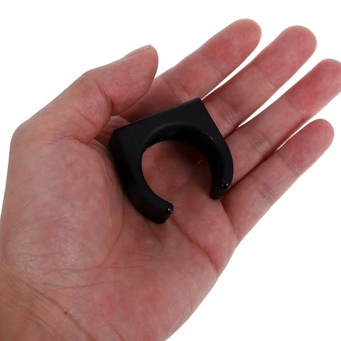Hand holding Two Pack Nylon Water Pipe Clamps For Marine Use, Easy Install Fishing Rod Holder Clips And Boat Accessories, black clip