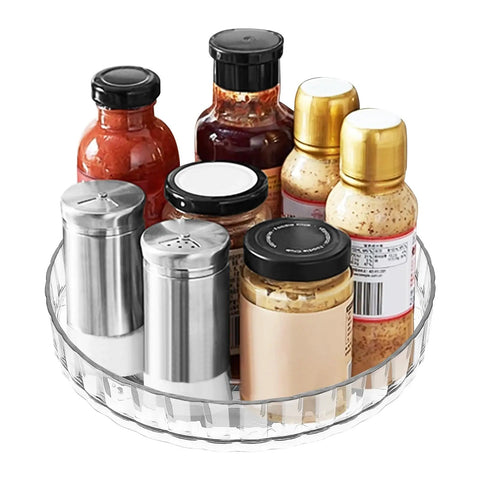Compact Clear Acrylic Lazy Susan Organizer 8 Inch Turntable displaying spices and sauces, suitable for cabinets and countertops.