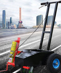 Heavy Duty Hand Push Line Paint Marker Roll Right Along Driveways Without Breaking A Sweat Crisp Stripe Applicator on paved road.