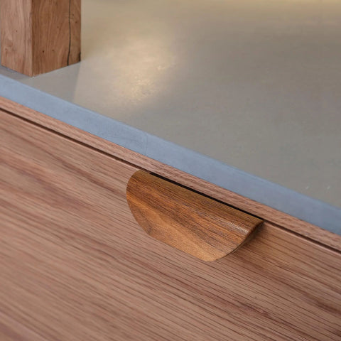 Oak Wood Oblique Angle 4.41 Inch Windbreaker Cabinet Door Handle In Antique Long Walnut Finish installed on drawer