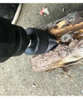 Amazon Tools firewood distributor drill bit, 38 mm round-handle, tapered bore, drilling into a log.