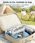 Foldable Electric Fly Swatter Racket With 4000V High Voltage, folded in a suitcase with camping gear, showcasing portability.