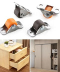 Heavy Duty Half Inch Mini Furniture Casters With Kickass Silent Glide Rubber Tires And Solid Steel Mounting Plates For Quick Home Office Upgrades And Desk Repairs on a wooden drawer unit.