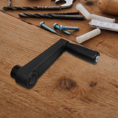 Foldable Crank Handle Nylon Rotary Grip For Milling Machine And Lathe Ergonomic Non Slip Textured Quick Replace Lever on wooden workbench.
