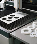3 Pack White PTFE Teflon Sheets 12 x 6 Inches, One Sixteenth Inch Thick, cut into circles on a crafting machine table