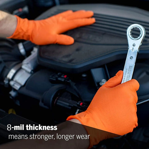 8 Mil Orange Diamond Textured Nitrile Gloves For Heavy Duty Auto And Industrial Tasks 100 Count Extra Size worn while using a wrench on an engine.