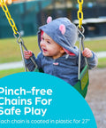 Toddler enjoying outdoor baby swing for toddlers with high-back bucket seat, heavy duty coated chains, backyard swing accessory