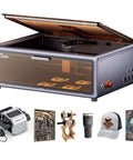 CREALITY FALCON A1 laser engraver, enclosed silver-gray with lid open; 6 accessories shown