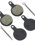 Top-view disc brake pad set for mountain bike with two friction pads, backing plates, and retaining pins.