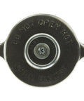 Top view of T-13 Radiator Cap Drop-In Fit For Ford F-150 75-96, Ranger 83-97, F-250 66-97, F-350 65-97, Bronco 66-96, and Jeep Wrangler 87-93