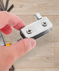 Hand holding Stainless Steel Glass Door Hinges Set For Cabinet Doors, Four Pack, Flexible Lightweight Pivot Hinges Fits 5 To 7mm Glass
