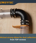 4 Inch 90 Degree Dust Collection Elbow in Black ABS Plastic, Right Angle Connector for 4 Inch Hoses and Pipes on wood surface