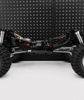 Image of Stainless Steel High Clearance Suspension Linkage Set for Redcat Ascent Fusion 1/10 RC, showcasing undercarriage setup.