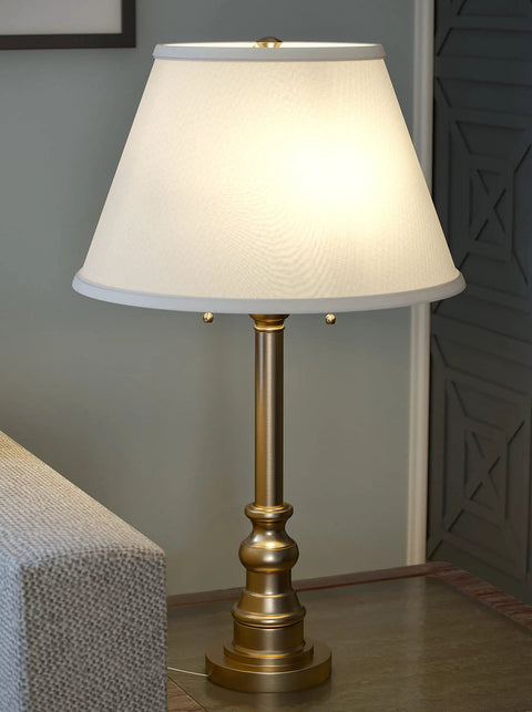 Spyglass Table Lamp With Antique Brass Finish Dope Retro Modern Classic Vibe Linen Shade 30.5 Inch Tall on a side table