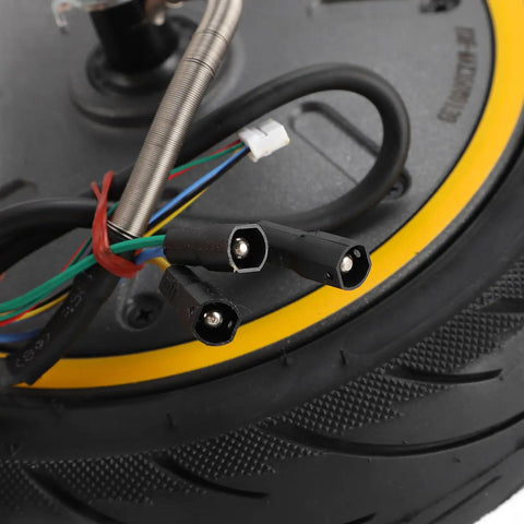 Close-up of electrical connectors on rear wheel drive hub motor for electric scooter 36V 350W replacement, rubber tire visible.