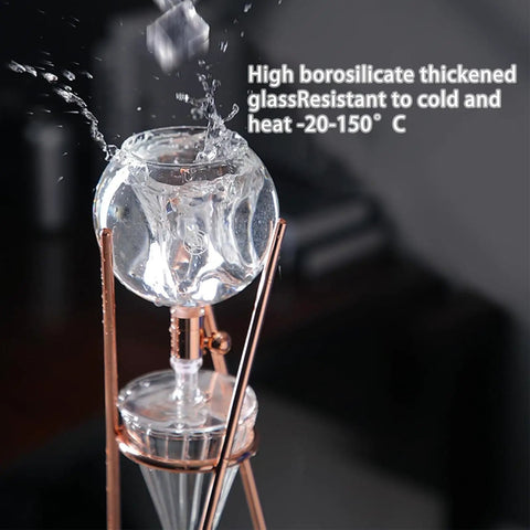 Premium Smooth Cold Brew Drip Tower With Sturdy Stainless Steel Stand Adjustable Flow Controller Iced Coffee Maker, featuring borosilicate glass and water splash.