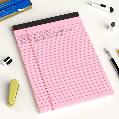 Five Pack 5x8 Legal Pads With Colored Covers Narrow Ruled Perforated Writing Pads For School And Office 30 Sheets Per Pad Great For Note Taking Studying And Quick Brain Dumps on a desk with pink paper and pens