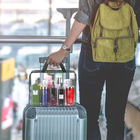 Traveler carrying Two Piece Large Clear Makeup Organizer Set With Durable Plastic Tote Bags Waterproof Transparent Handbags.
