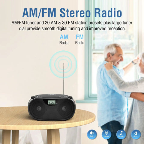 Portable CD Player Bluetooth Boombox with AM FM Radio on a table, showing digital tuner and stereo speakers in a home setting
