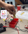 Hands-On Compact Electronics Kit Mini Pack for Charles Platt Third Edition Electronics Book Includes Resistors, Capacitors, LEDs, and Small Components to Complete Experiments 1 Through 5 ProTechTrader Quality used in circuit assembly with connected wires on a table.