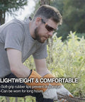 Man wearing Outdoor Safety Sunglasses For Work And Play With Smoke Lenses, UV 99.9 Percent Protection, doing garden work