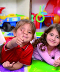 Children playing on Six Assorted Color 12 by 12 Inch Liquid Floor Tiles Set for Kids, showing vibrant sensory tiles in use.