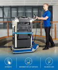 Heavy Duty Electric Stair Climbing Hand Truck With Dual Motors And Smart Load Balancing Board Handles 925 Pounds Of Weight in use transporting a printer.