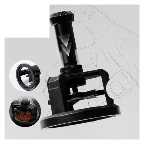 Automatic Rotating Wdt Tool Espresso Needle Distributor Anti Clumping Coffee Grinder Accessory 53 Mm close-up view with hand.