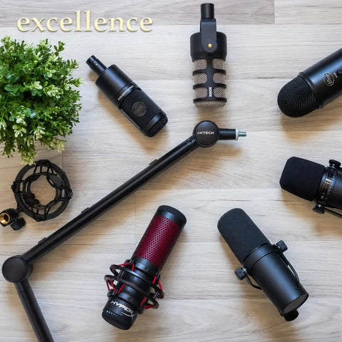 Adjustable Dope Broadcast Microphone Arm With Desk Mount 360 Degree Rotatable Scissor Arm and various mics on wooden surface