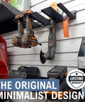 Electric Drill Storage Rack With Wall Mount Organizer Holds 4 Drills Plus Accessory Shelf Heavy Duty Steel With Scratch Resistant Finish Great For Garage Workshop Home Shed shown installed with tools.
