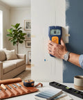 Fafeicy Stud Finder Wall Scanner with LCD Display for Live Wire Detection in use on a wall, detecting studs and wires.
