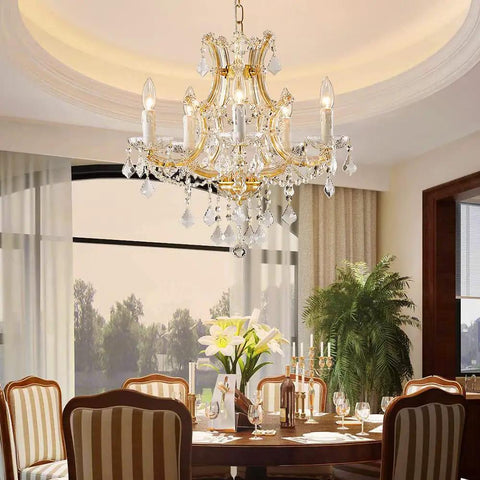 Gold 5 Light Maria Theresa Crystal Chandelier With Adjustable Chain Up To 52 Inches E12 Bulb Ready LED Compatible Modern Luxury Ceiling Fixture for Dining Room with elegant table setting.