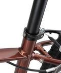 Ultra Lightweight Aluminum Bike Seat Post Clamp 31.8mm to 34.9mm Diameter installed on brown bicycle frame