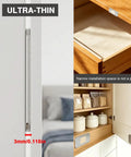 8 Pack Ultra Thin No Drill Magnetic Cabinet Door Catches With Invisible Adhesive Tape For Kitchen Cupboard And Bathroom Drawer Hardware that shows the catch's slim profile and installation in narrow spaces.