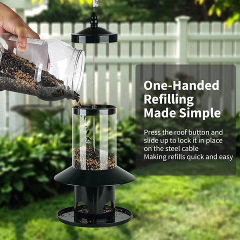 Person refilling Ultimate Squirrel Proof Bird Feeder With 360 Degree Perch Tray For Outdoor Hanging Use Weather Resistant Rainproof Roof