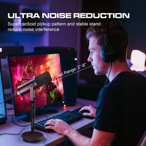 Man using Dynamic USB XLR Podcast Microphone For Streaming And Recording at a computer desk with gaming setup.
