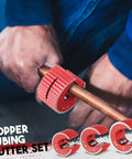 Person using Beast Copper Pipe Cutter Set With One Half Inch, Three Quarter Inch And One Inch Cutters on copper tubing