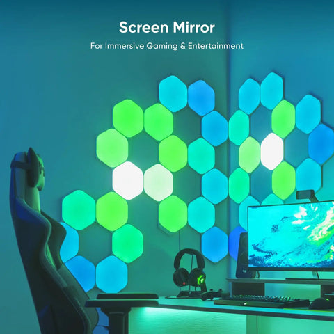 Hexagon Shapes Expansion Pack For Smarter Kit build on wall in gaming setup with RGB LED panels in blue and green hues
