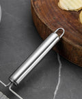Stainless steel potato crinkle slicer handle with hanging loop, close-up view